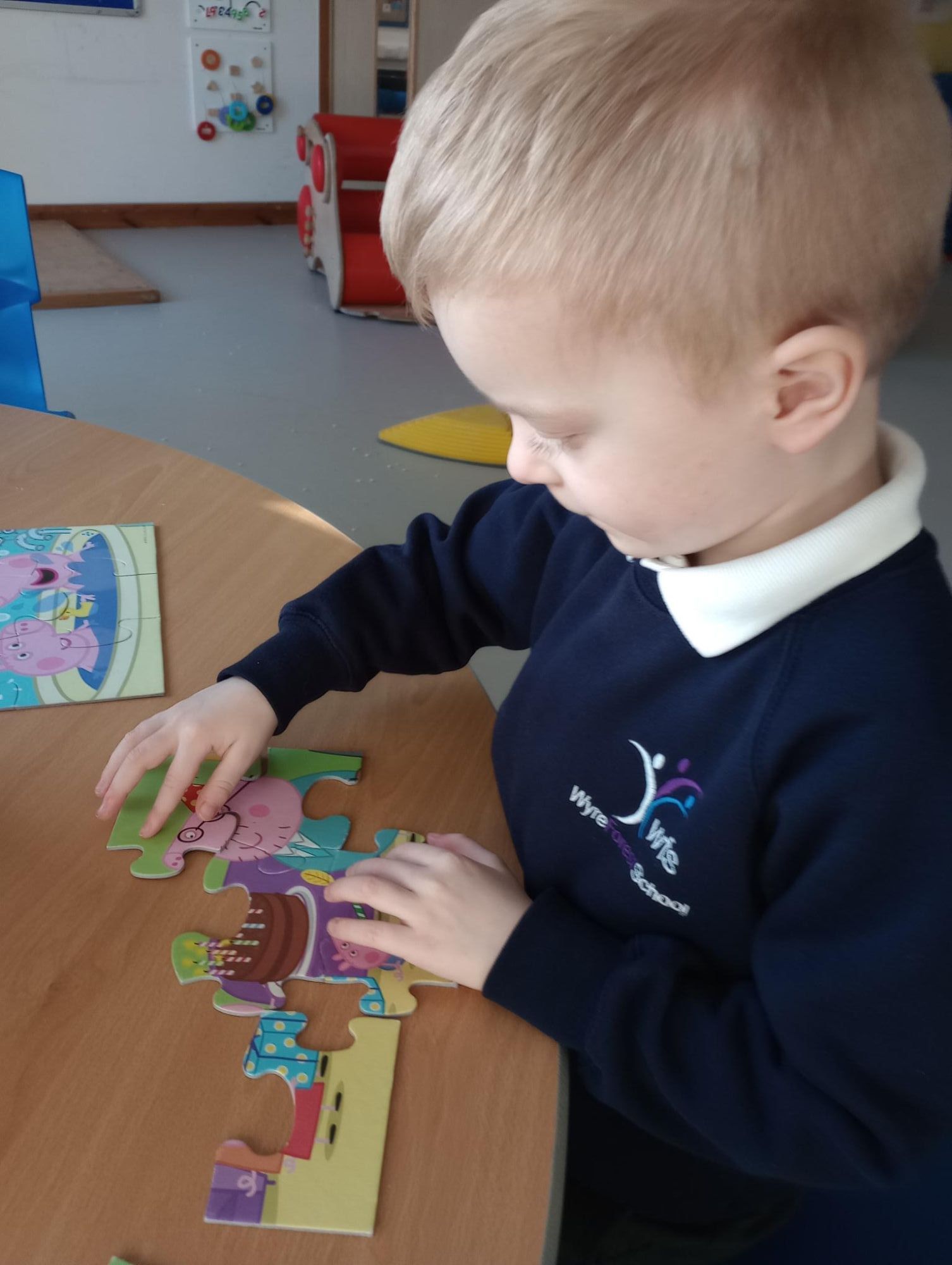 Student doing jigsaw puzzle